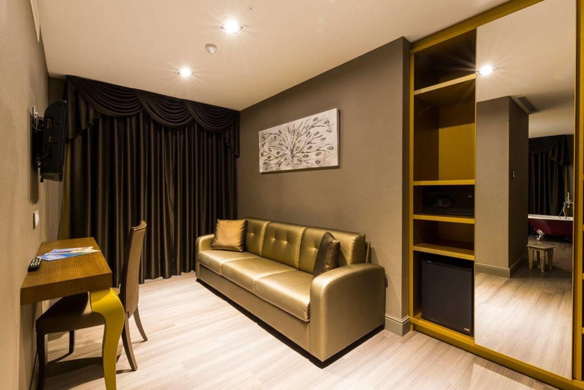 Sant Jordi Boutique Hotel Calella Exterior photo A living room in a serviced apartment in Hong Kong